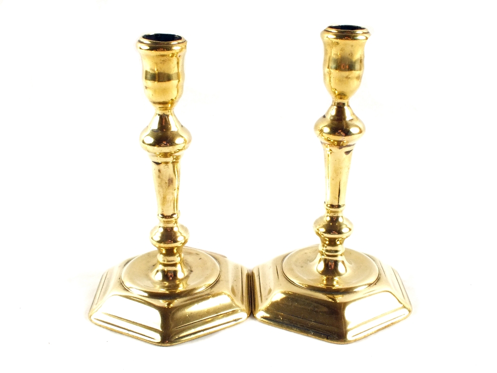 A pair of Queen Anne seamed Brass candlesticks with baluster columns and hexagonal bases, 6 1/2"