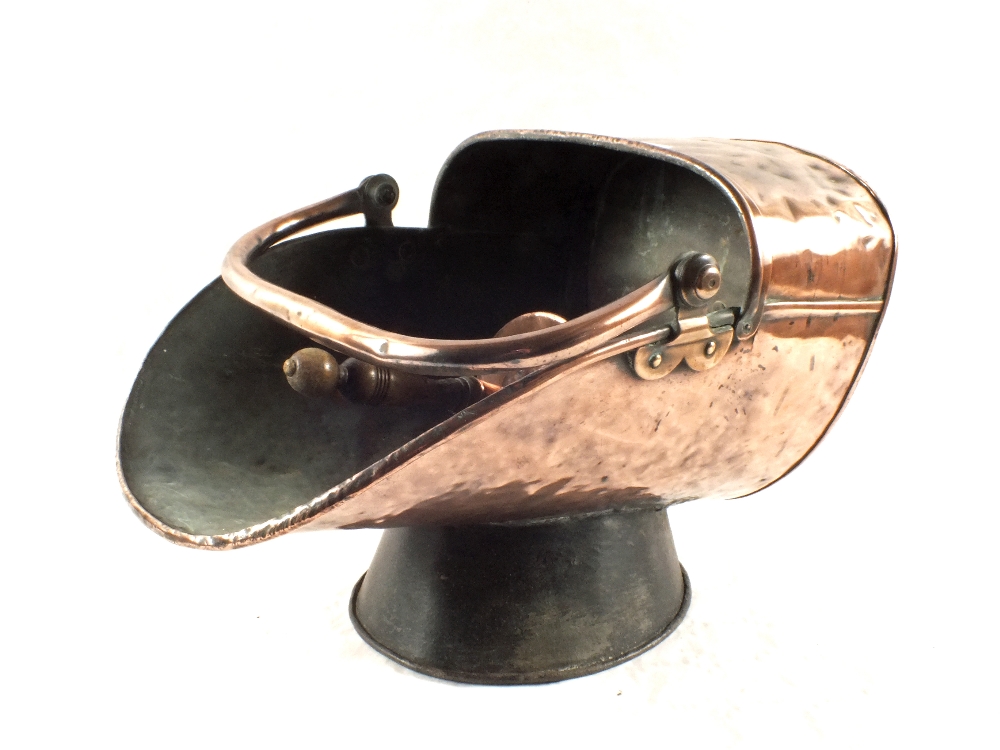 A 19th Century Copper coal scuttle with swing and fixed handles and Copper shovel