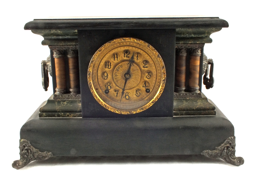 An American Welch ebonised mantel clock