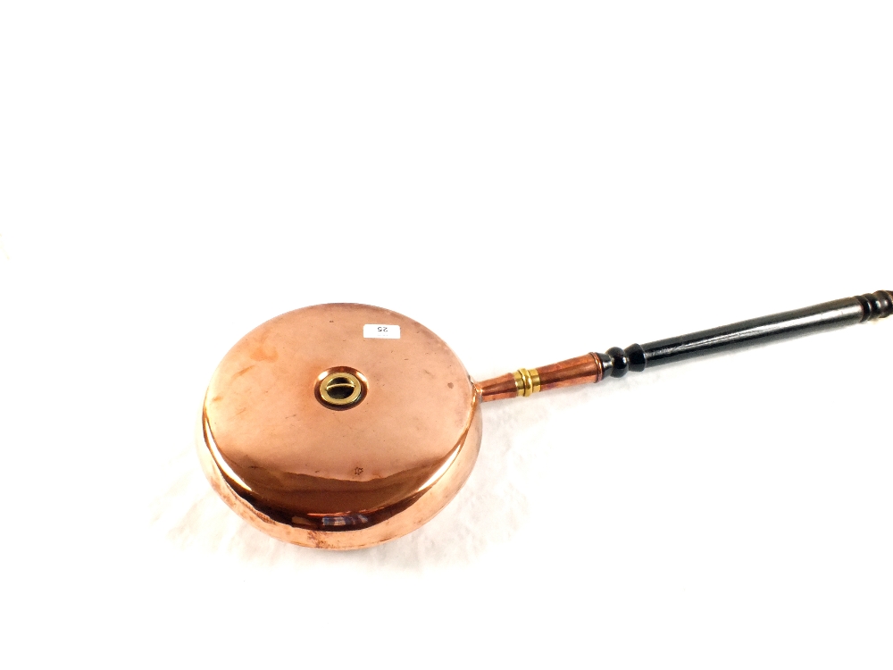 A 19th Century Copper warming pan