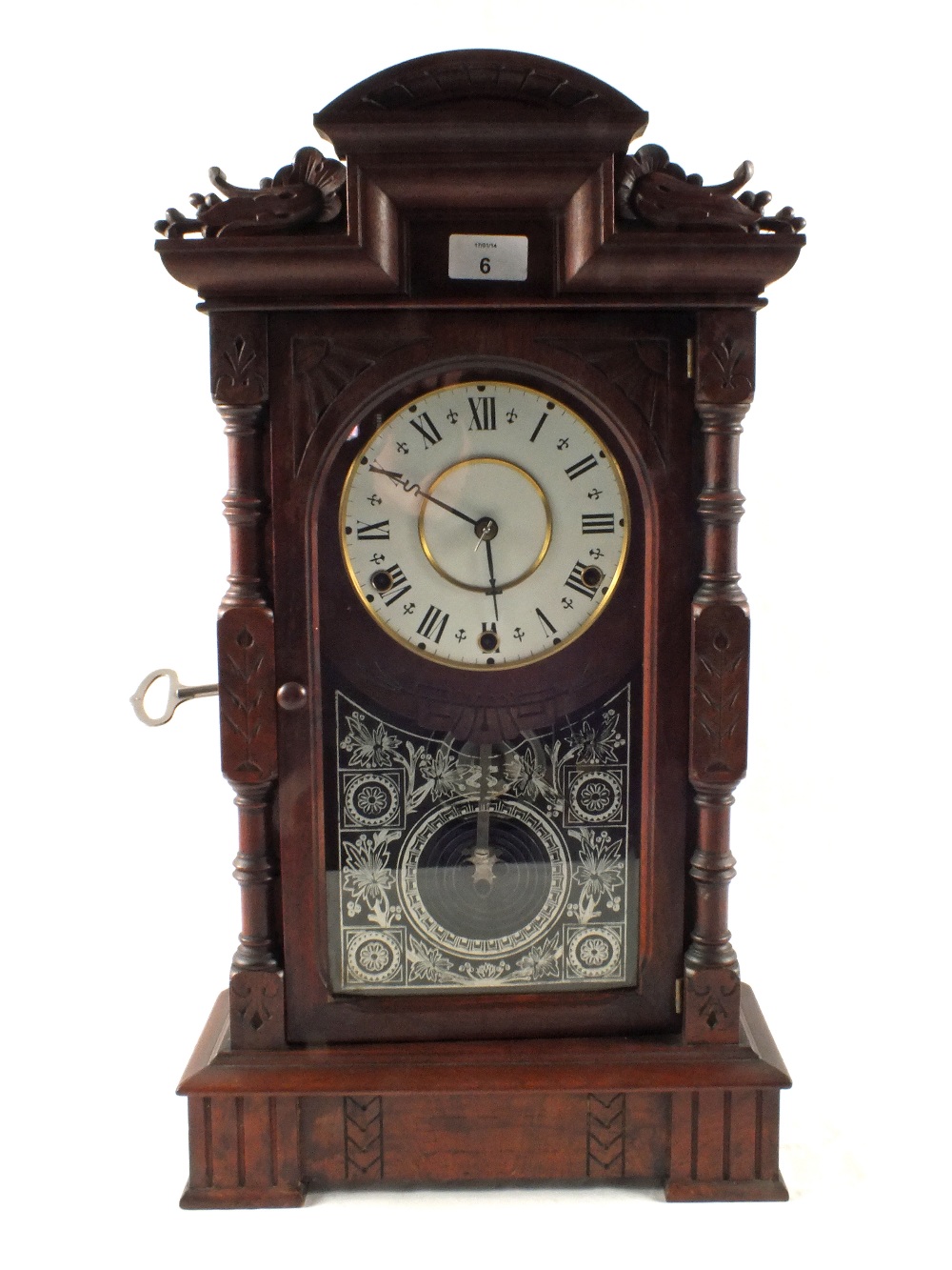 An American eight day mantel clock, three train movement by Seth Thomas with ST hands, quarter