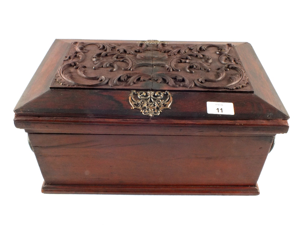 A continental Mahogany workbox with applied acanthus leaf decoration