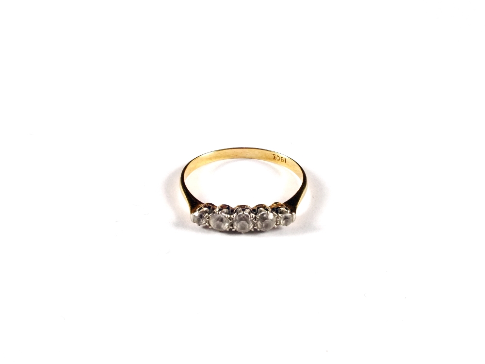 An 18ct Gold and white stone ring, size P 1/2 approx