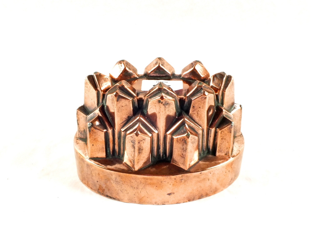 A Victorian oval Copper jelly mould of turret form by Benham & Froud, 6 3/4" wide