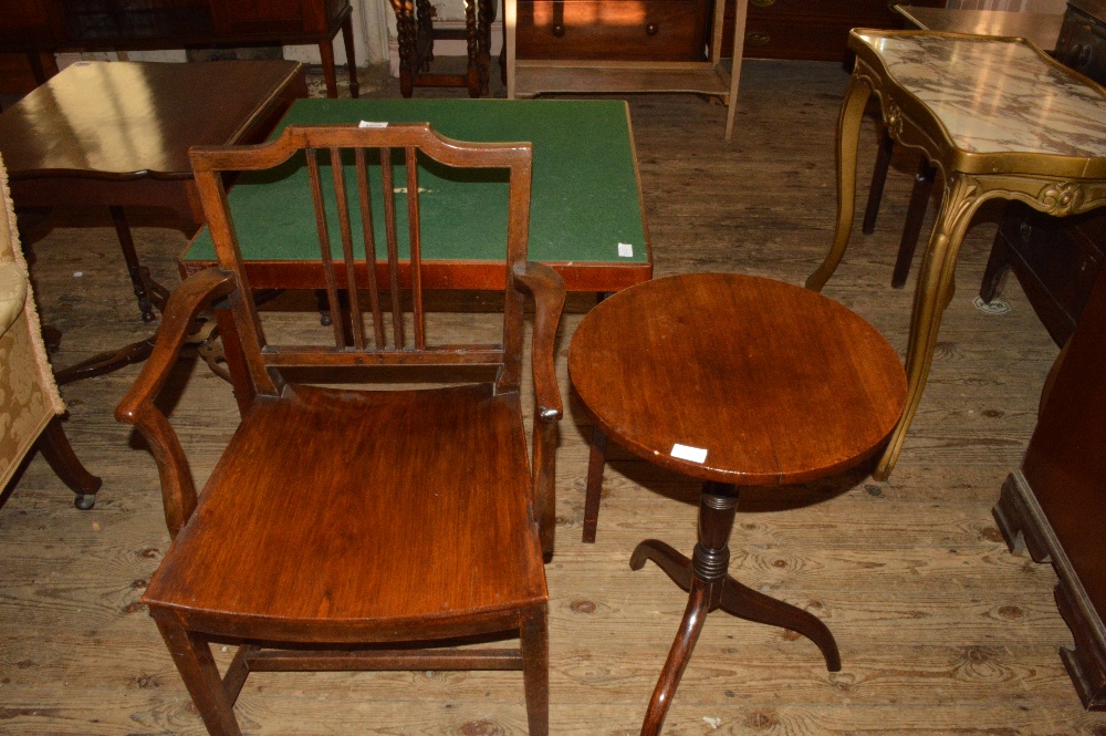 A card table, a tripod table and a country armchair