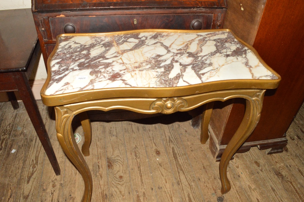 A marble topped side table