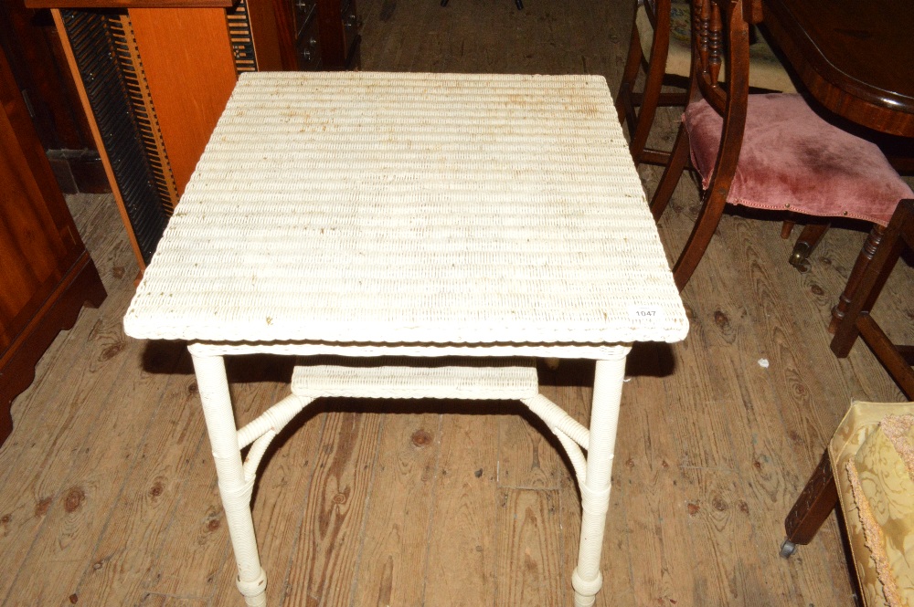 A Lloyd Loom single shelf table