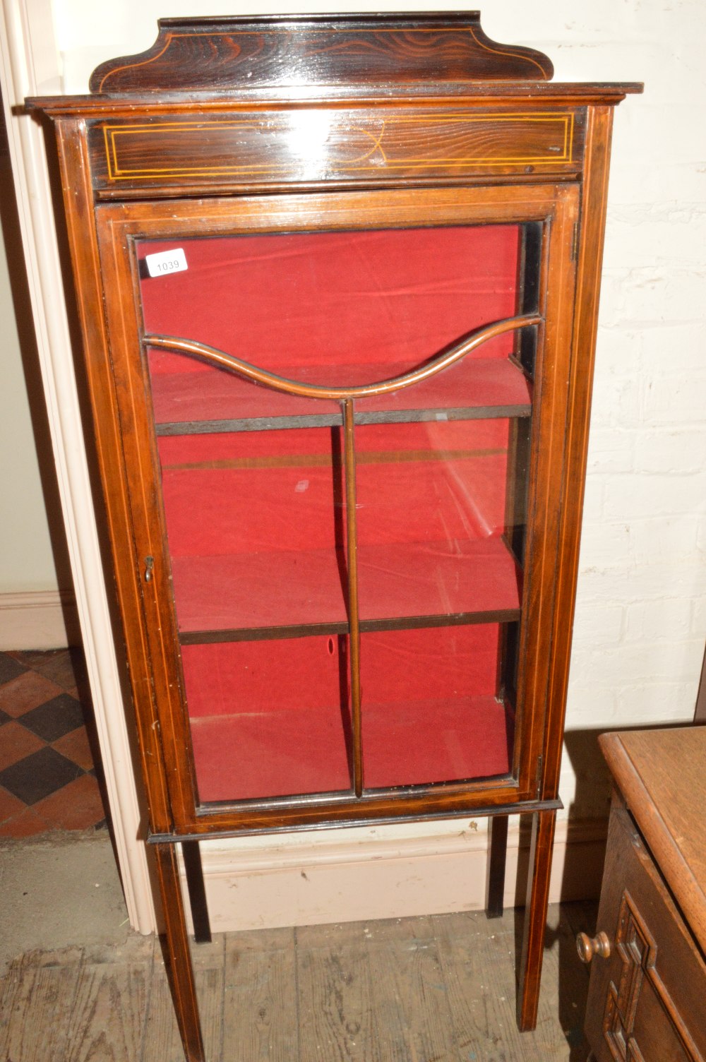 A small inlaid glazed display cabinet