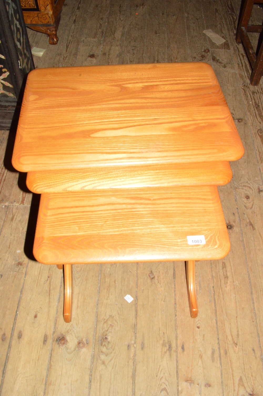 A Jentique nest of three light Oak tables