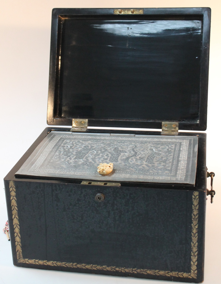 A 19thC Chinese export ebonised box, with gilt detail and two carrying handles, the hinged cover