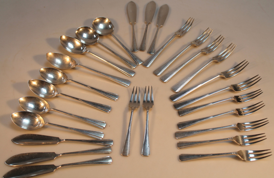 A 20thC silver part canteen of cutlery, by Wilson and Gill, of an Art Deco design, comprising