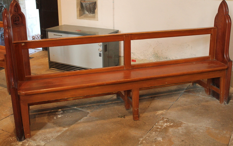 A 19thC and later pitch pine church pew, with prayer rail to the back, 231cm wide.