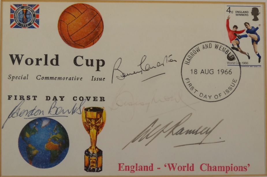 A World Cup 1966 first day cover, signed by Sir Alf Ramsey and Gordon Banks etc, mounted and framed,