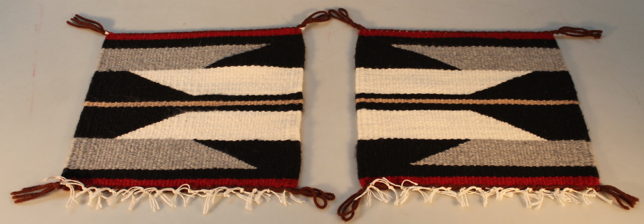 A pair of North American Navajo saddle bag covers, 28cm wide 30cm high.