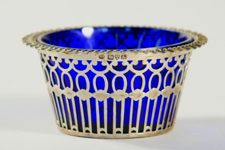 A late Victorian silver preserve bowl, with blue glass liner, Chester 1901.