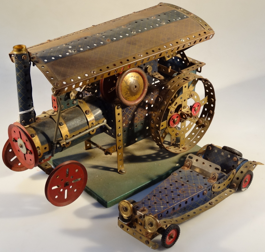 An assembled Meccano traction engine, 23cm high by 35cm long. Together with an assembled Meccano