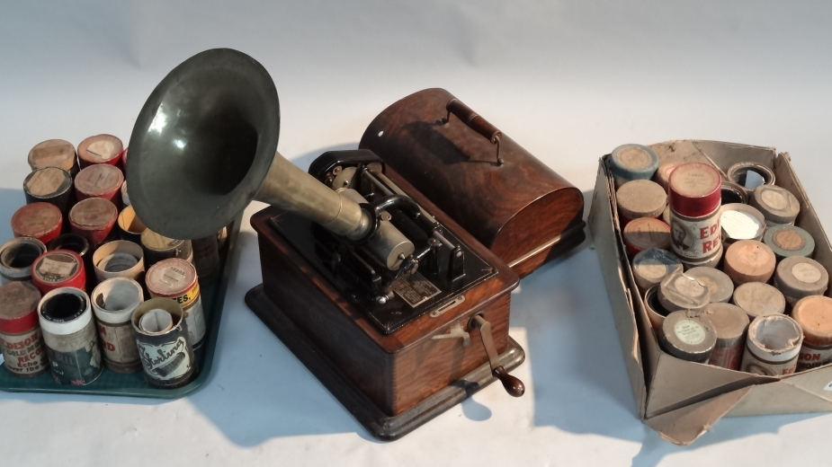 An oak cased Edison phonograph, with brass/metal horns serial No. 597988, 23cm wide, also