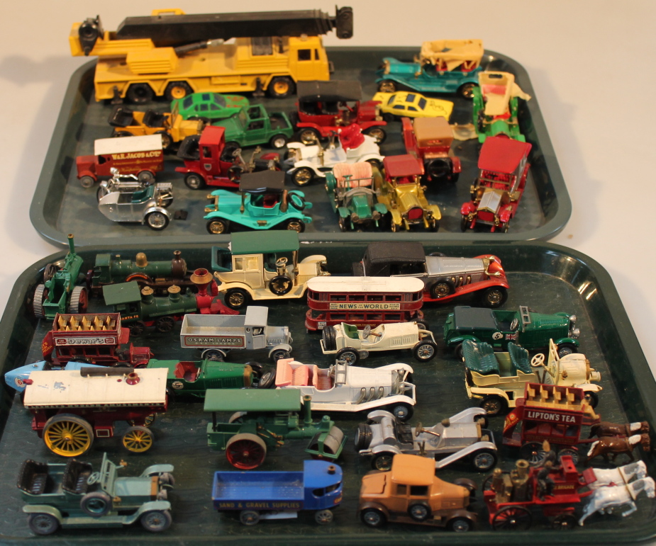 A collection of Lesney and Matchbox die-cast model vehicles, and others, all lacking boxes.