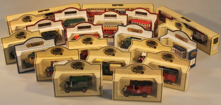 A collection of die-cast model advertising vehicles.