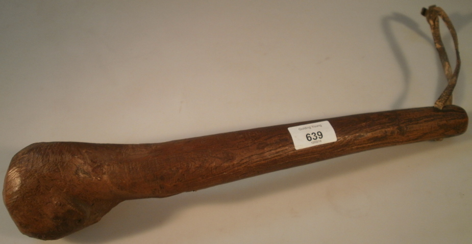 A wooden club, 41cm long.