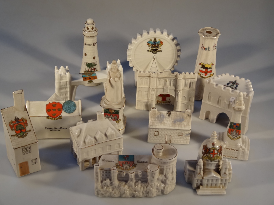 Fourteen pieces of assorted crested china, depicting buildings including, ferris wheel with