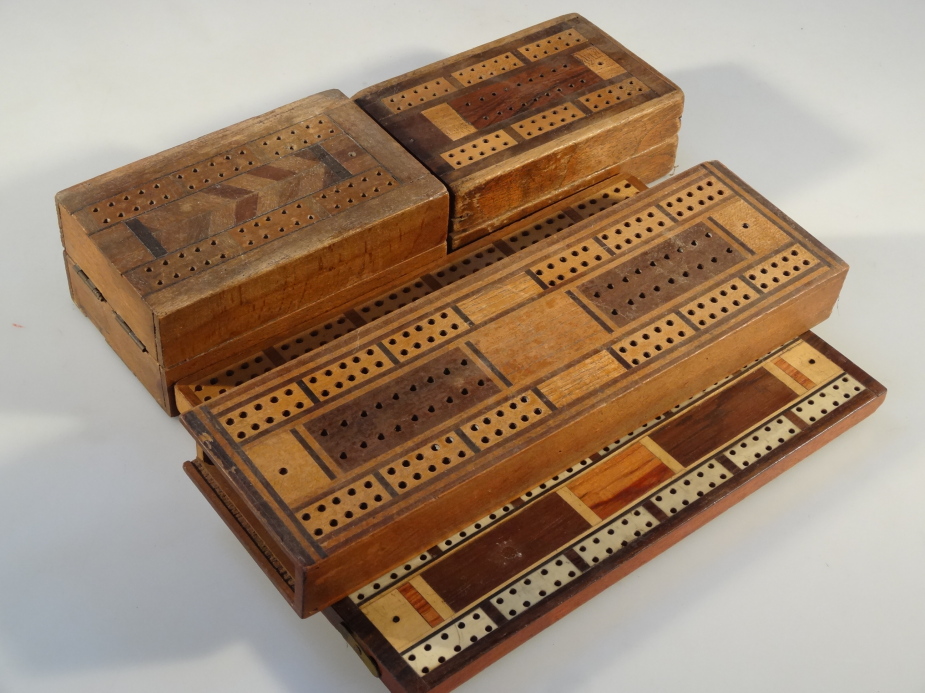 Five early 20thC inlaid cribbage boards.