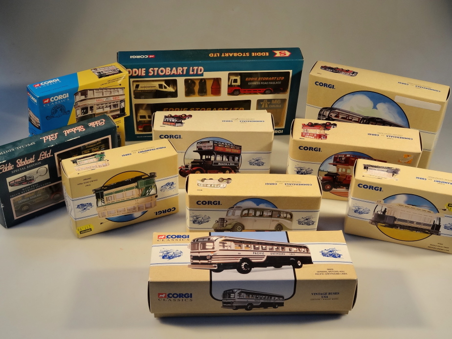A collection of Corgi die-cast lorries and coaches and trams, (11).