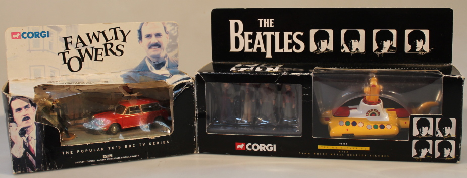 Two Corgi die-cast models of Fawlty Towers Austin 1300 estate and The Beatles Yellow Submarine, both