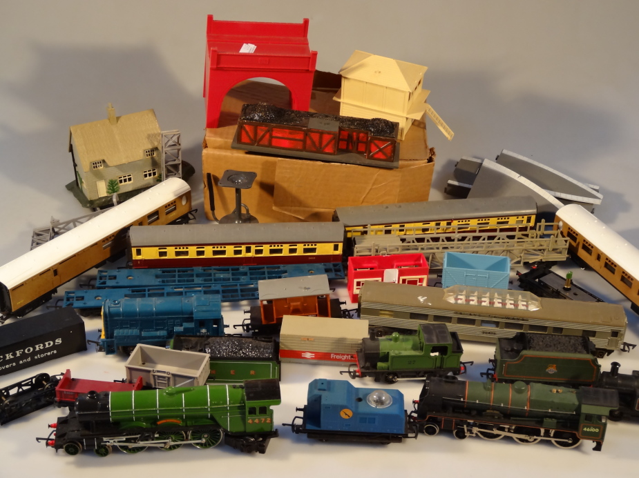 Five 00 gauge locomotives, with rolling stock and accessories.