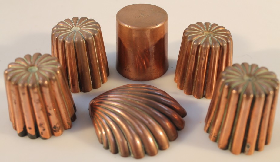 Six small Victorian copper jelly moulds, one stamped Metropol Brighton, 5cm high maximum, 3cm