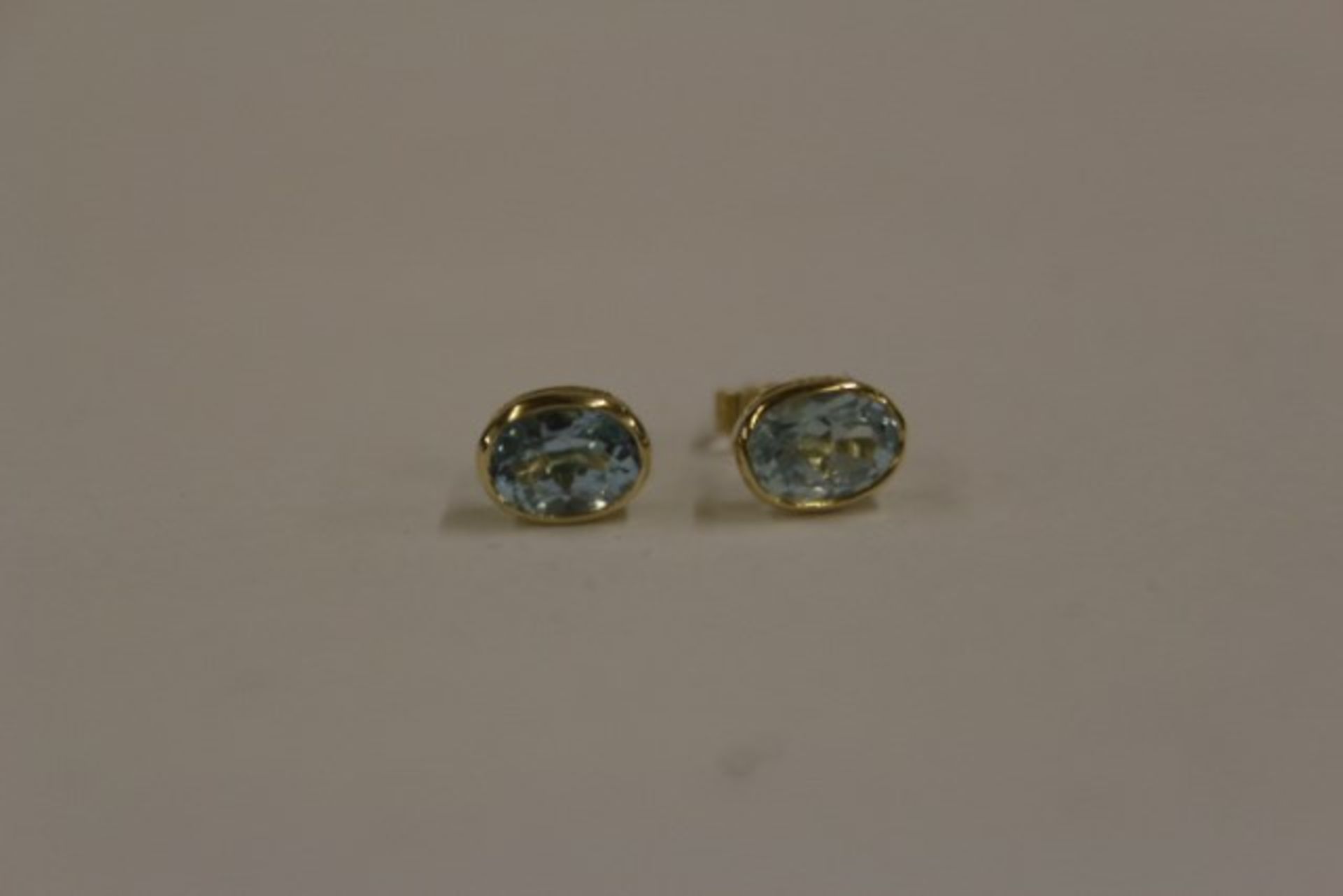 Pair Ladies Gold Blue Topaz Earrings