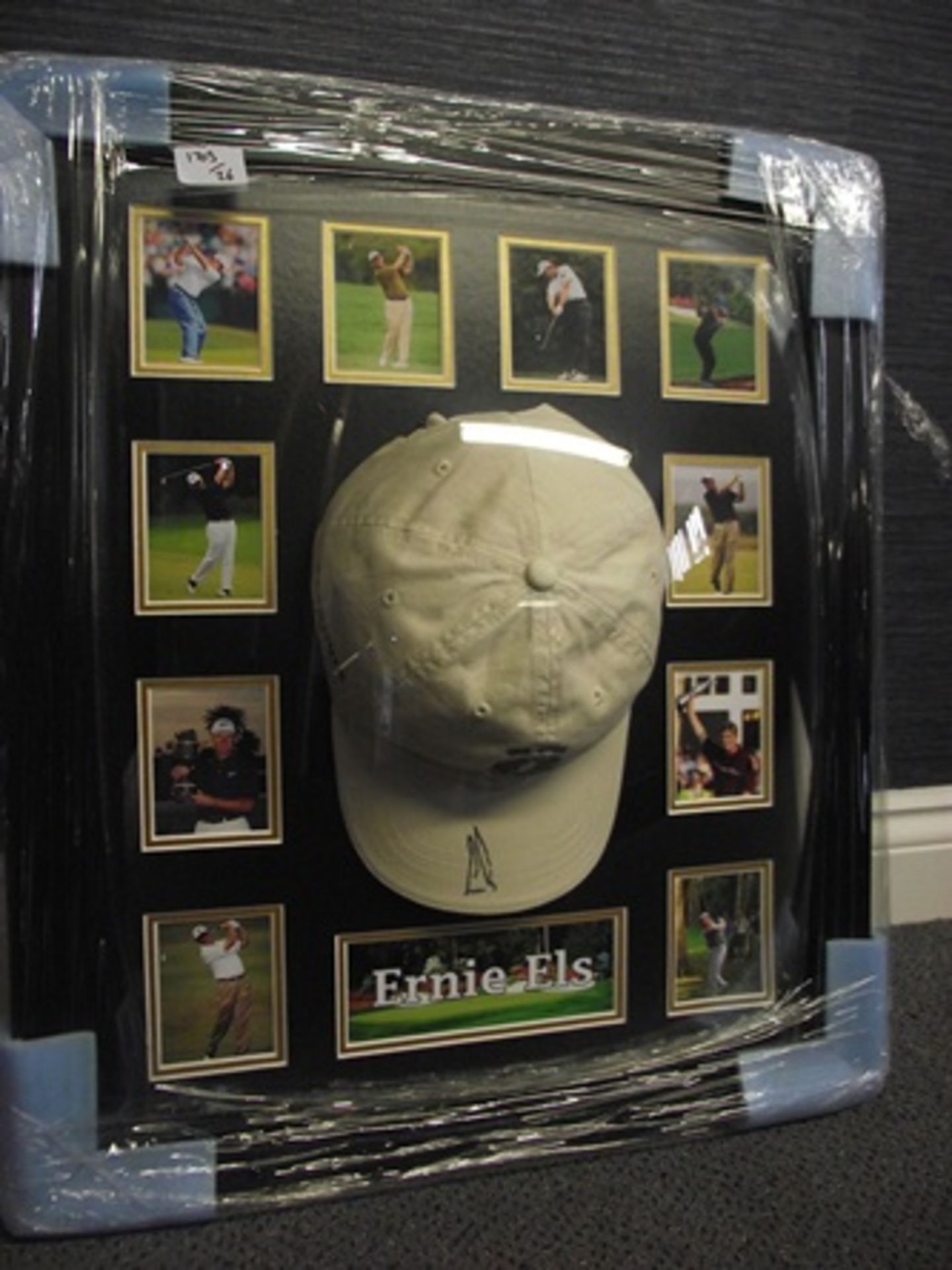ERNIE ELS FRAMED SIGNED CAP  WITH CERTIFICATE OF AUTHENTICITY