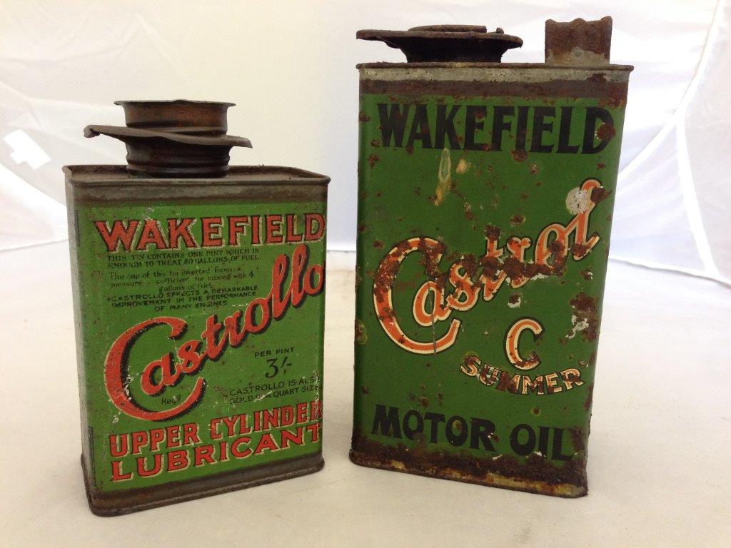 A small Wakefield Castrollo upper cylinder lubricant quart can and a Wakefield Castrol motor oil `C