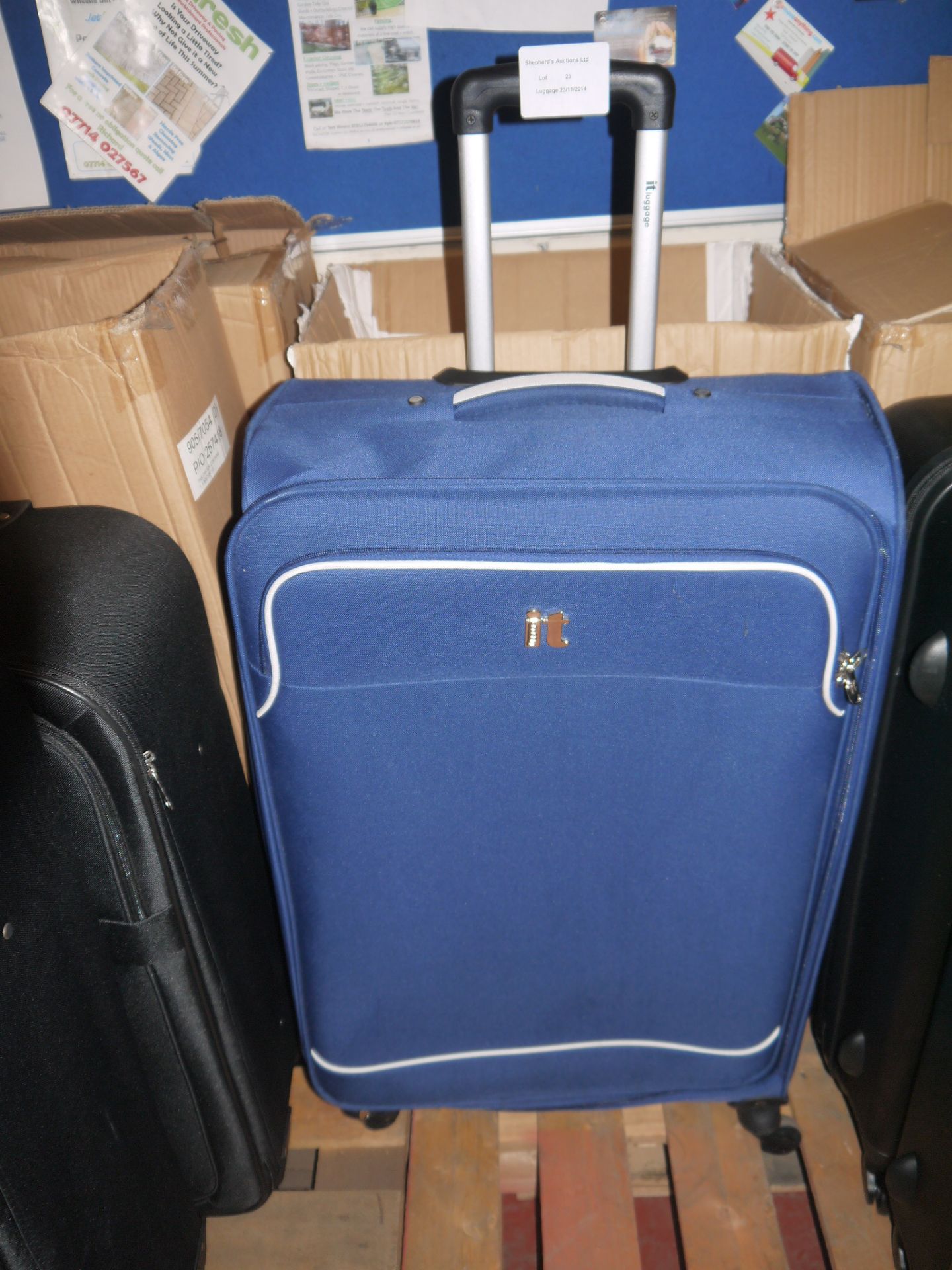 IT International Blue fabric suitcase, looks in Good condition