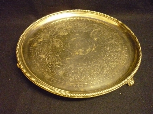Silver plated tray with rope twist rim, decorative engraving on 3 feet, 30ins