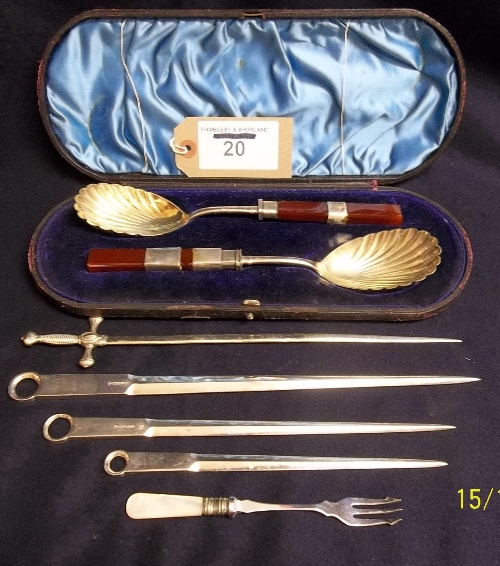 Pair of boxed silver plated serving spoons, 3 silver plated meat skewers & a silver plated letter