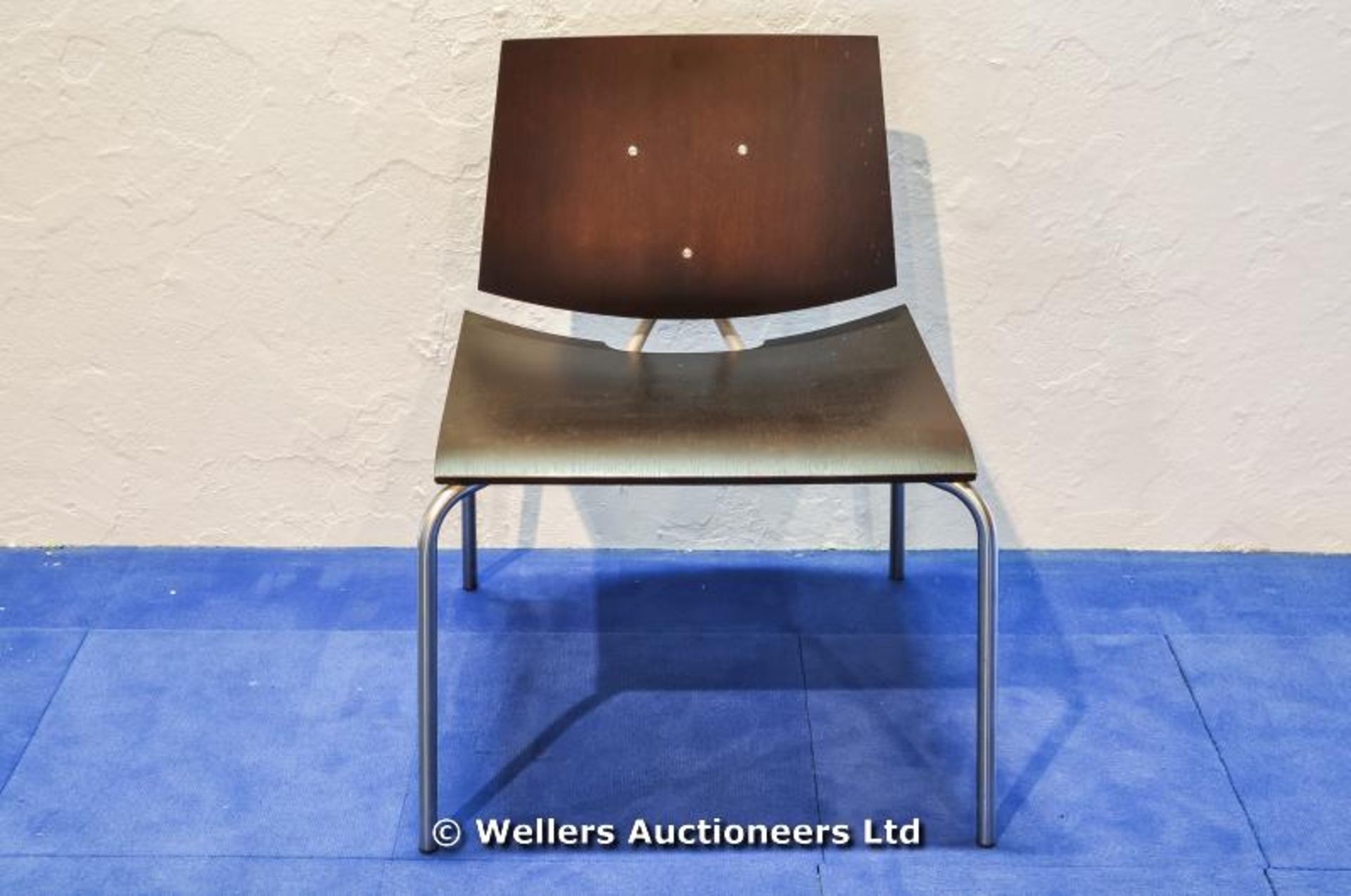 A `La Palma` Italian designer chair with metal frame and formed wooden seat and back