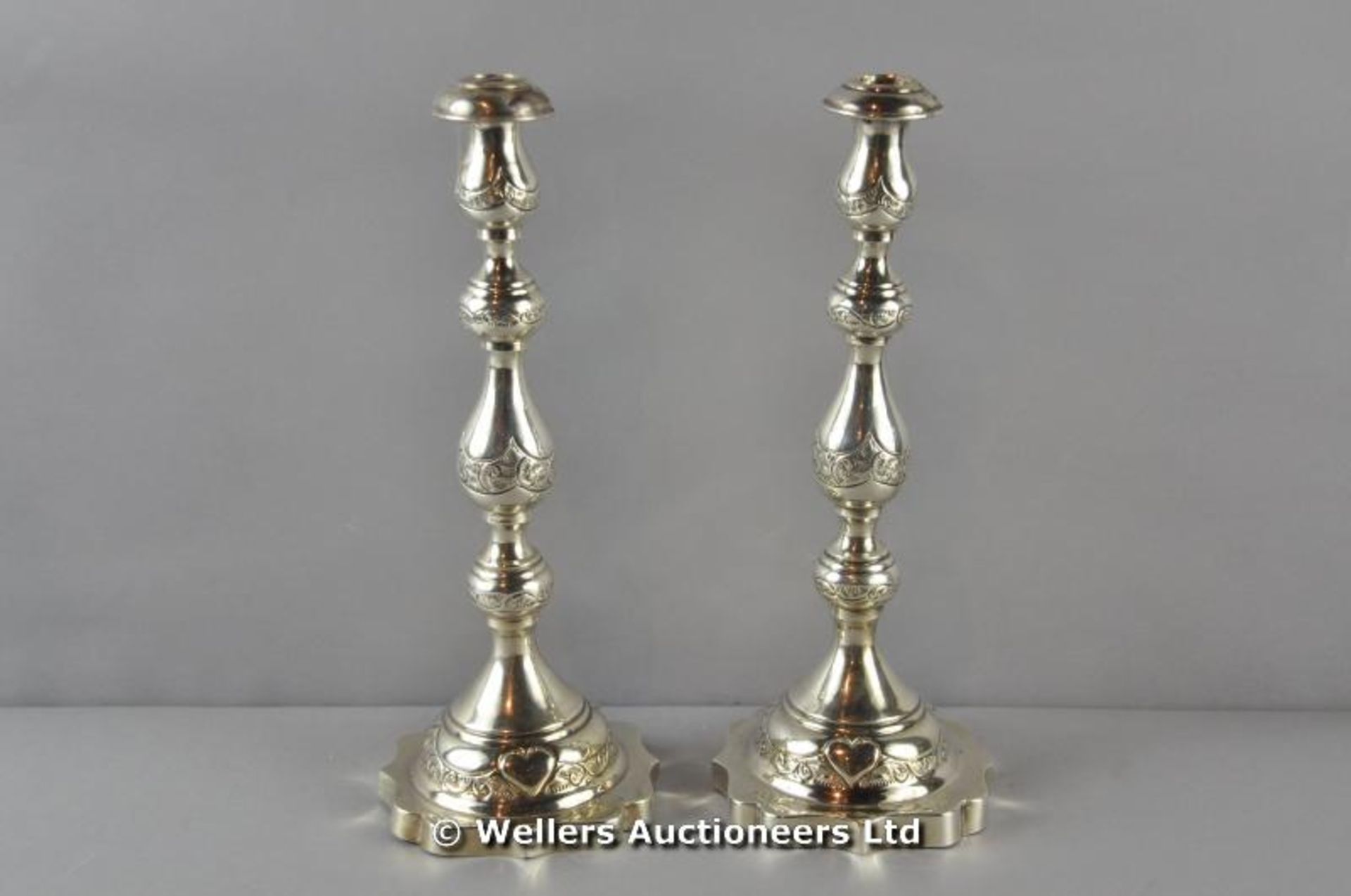 *A pair of silver candlesticks, London 1926, 32 cms high, 510 gms (Lot subject to VAT)