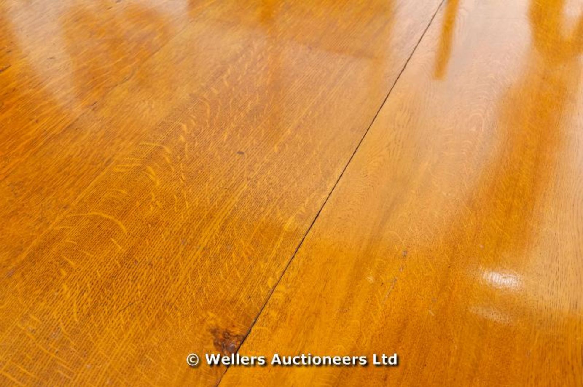 A Victorian wind out oak dining table with reeded column legs, two extra leaves and winder, 179 x - Image 3 of 4