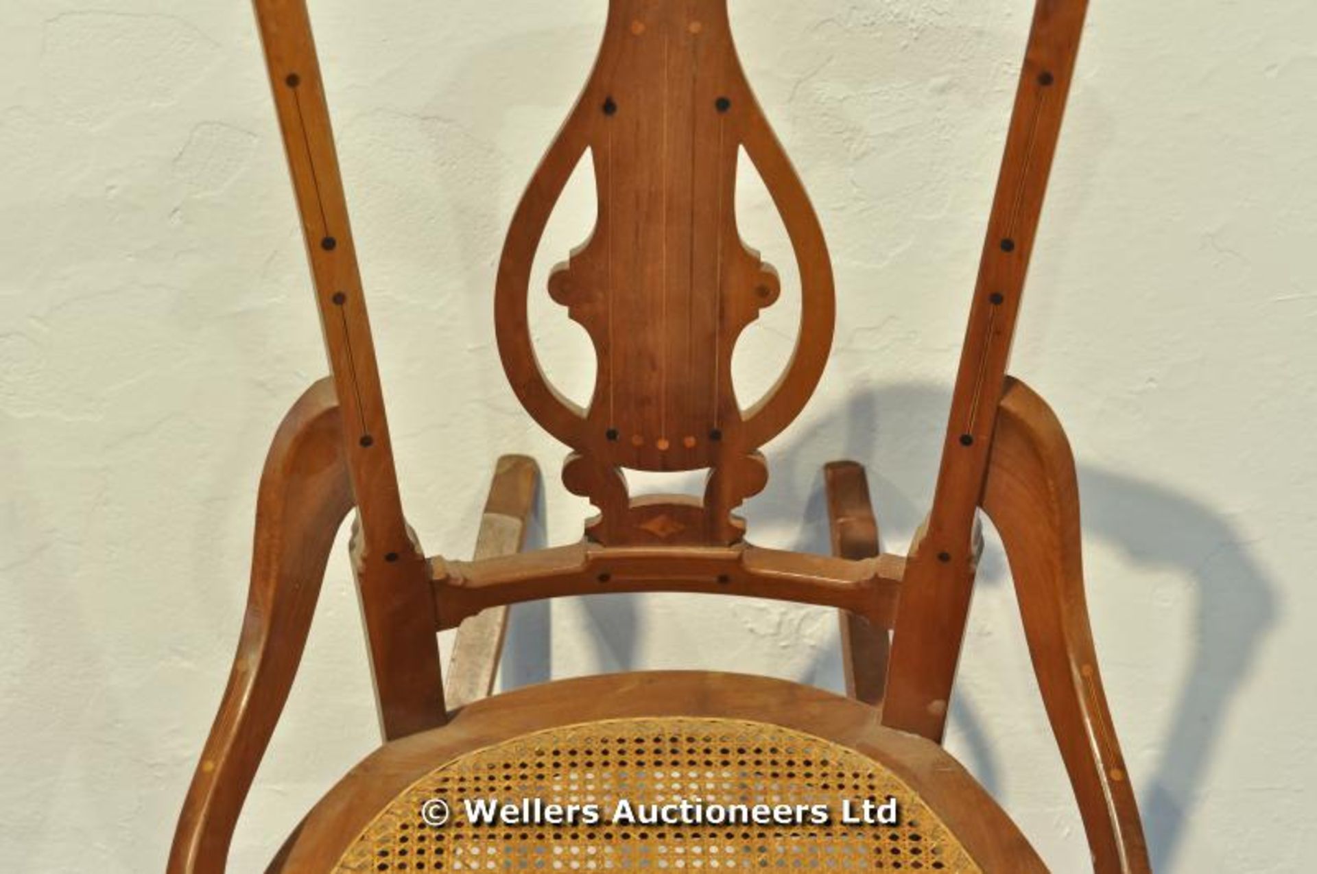 A rocking nursing chair with bergère cane seat inlaid detail to cresting rail and pierced lyre - Image 2 of 3