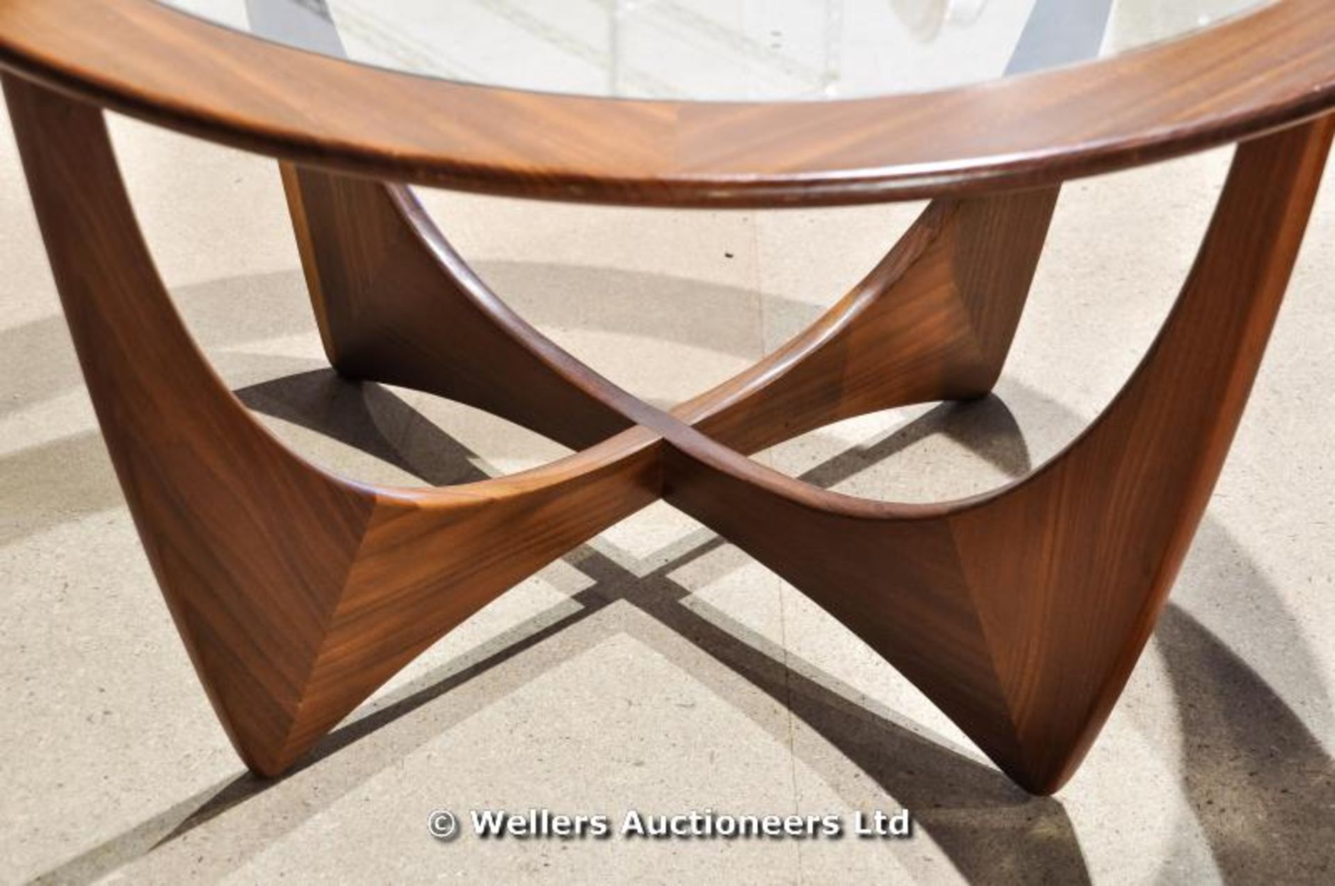 A G Plan circular glass and teak coffee table with X frame supports - Image 2 of 3