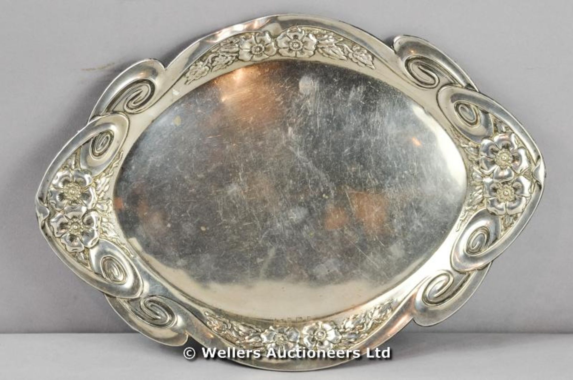 *A silver oval small platter with Art Nouveau decoration, Birmingham 1910, 204 gms (Lot subject to