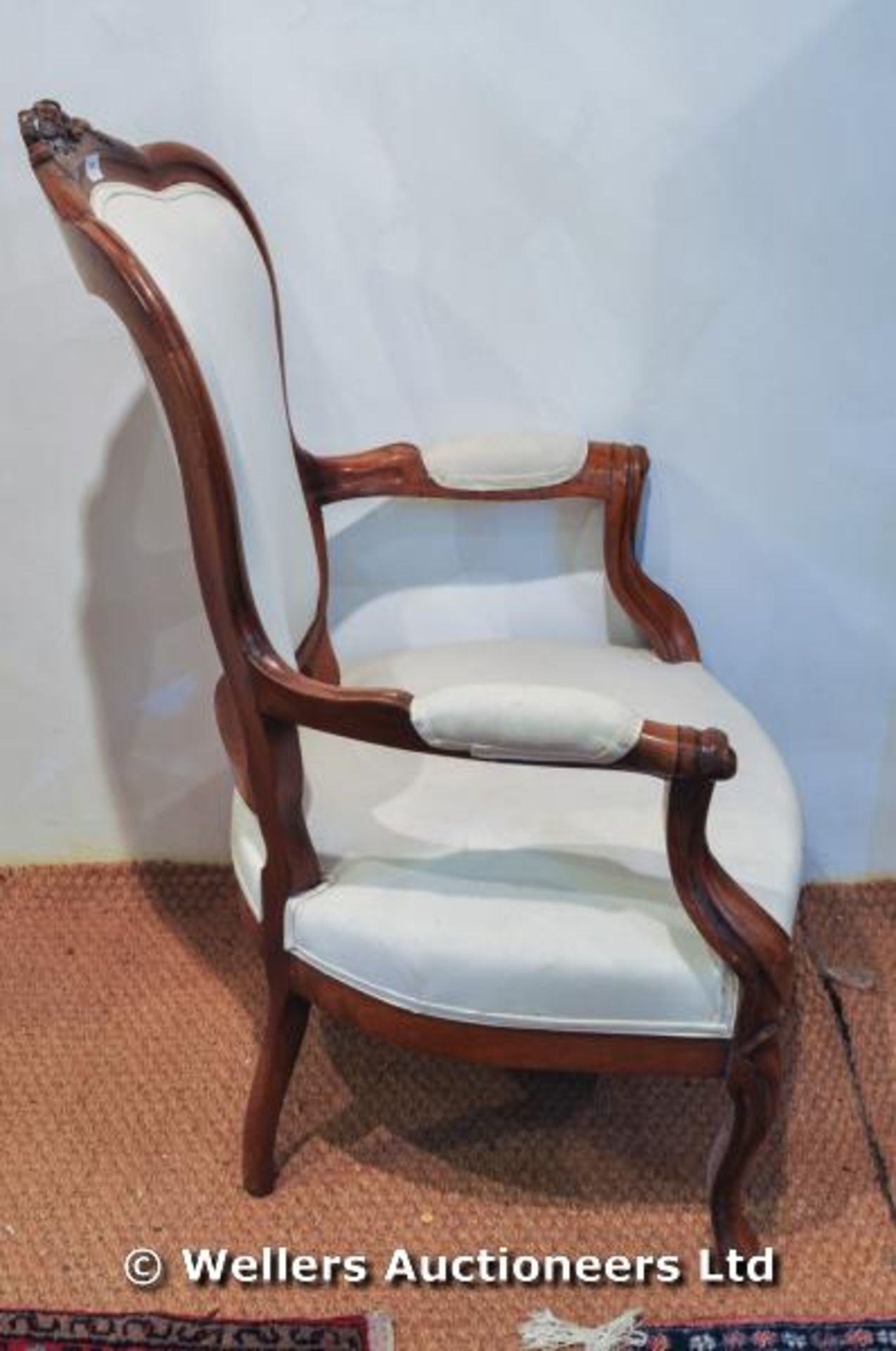 A Victorian walnut open armchair with carved detail of flowers to back, white upholstery - Image 2 of 2