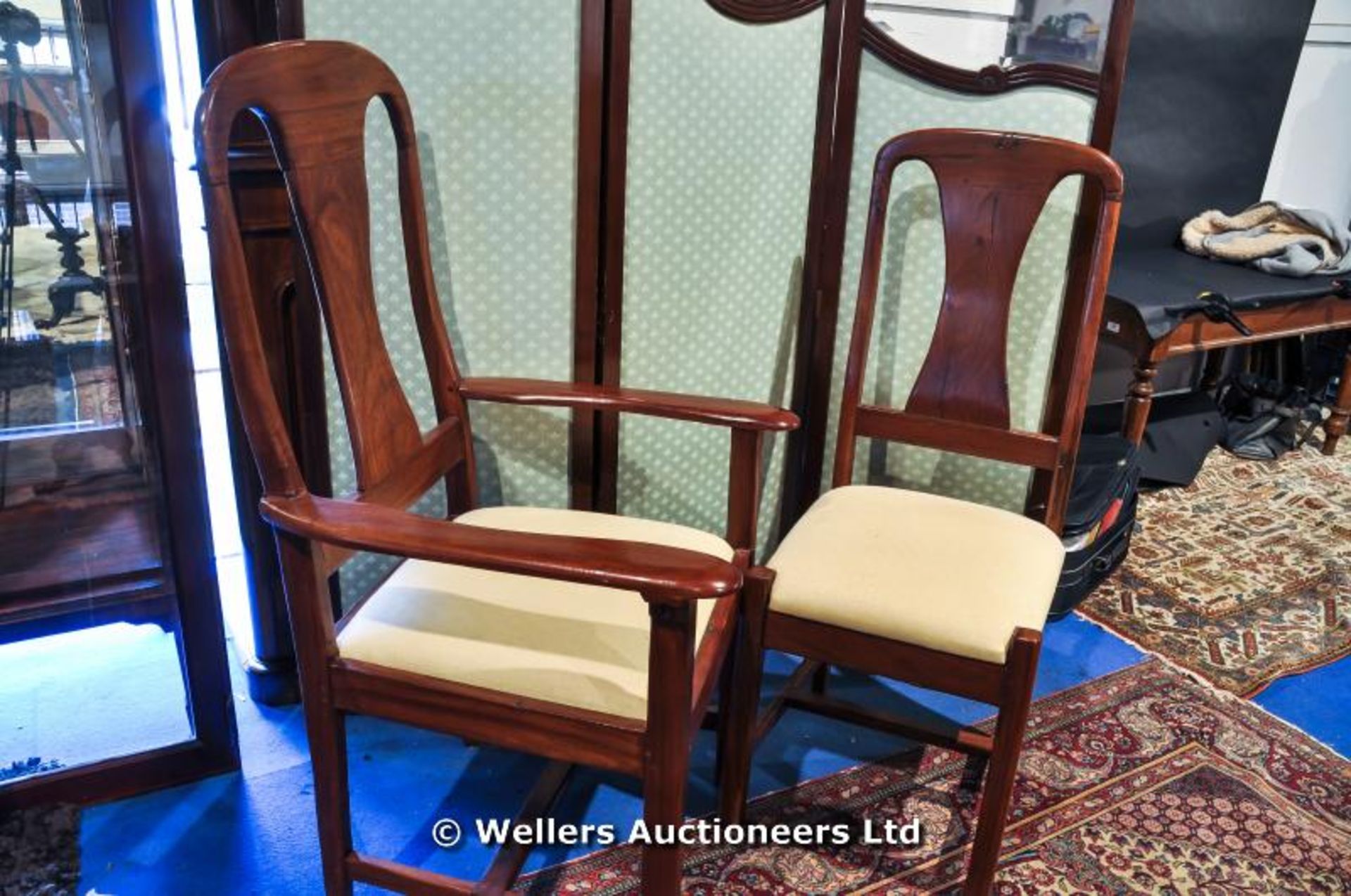 A set of Ten African Teak dining chairs including two carvers - Image 2 of 5