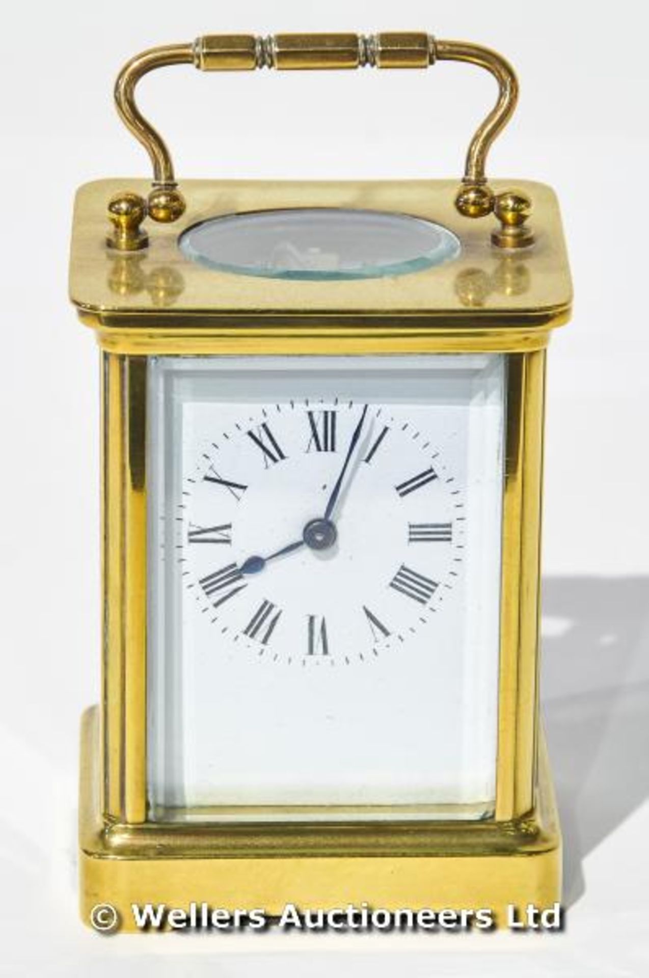 A French brass carriage clock with key