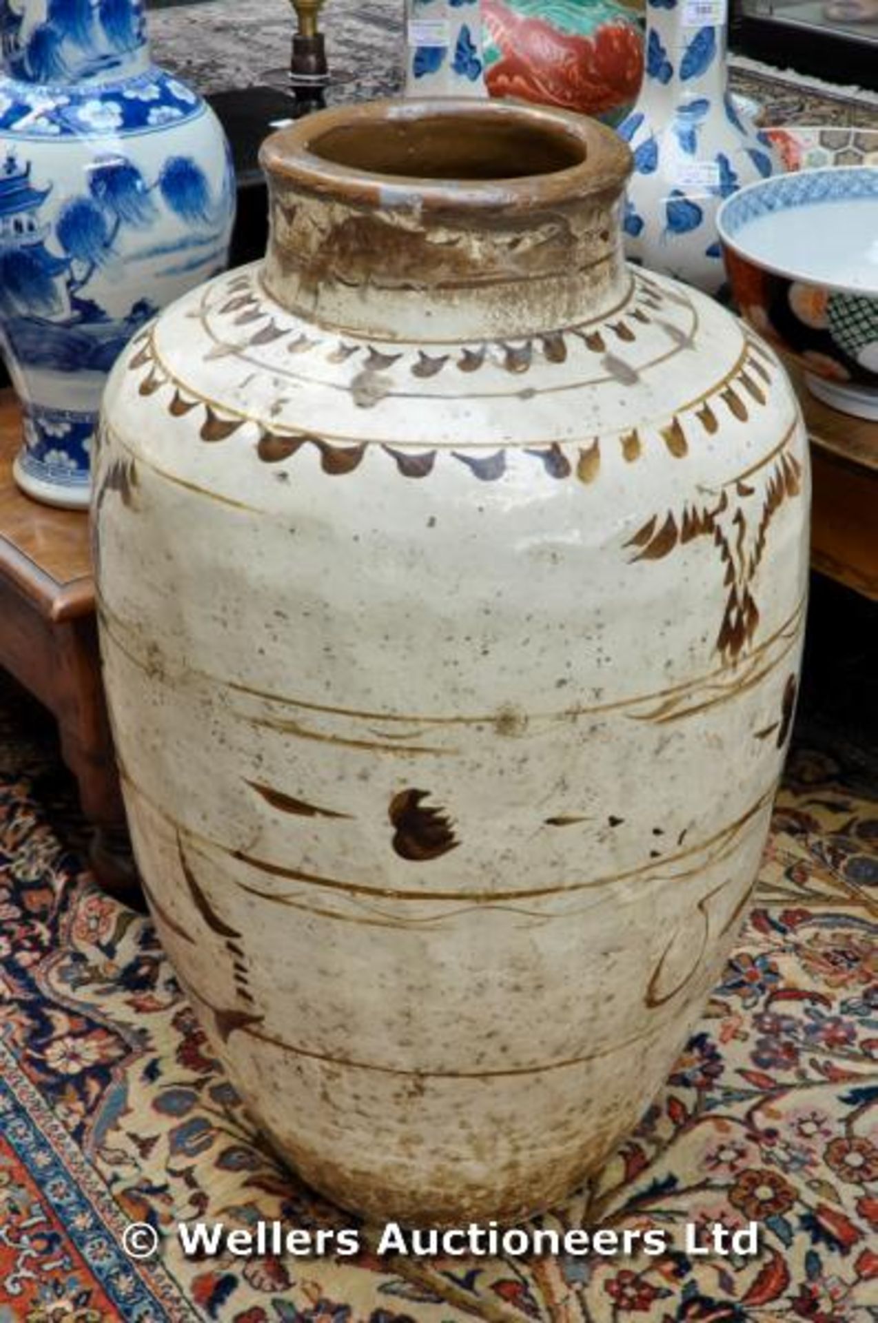 A large Chinese Cizhou (Tz`u-chou) pottery storage jar, oviform painted in brown slip, 65cm - Image 2 of 3