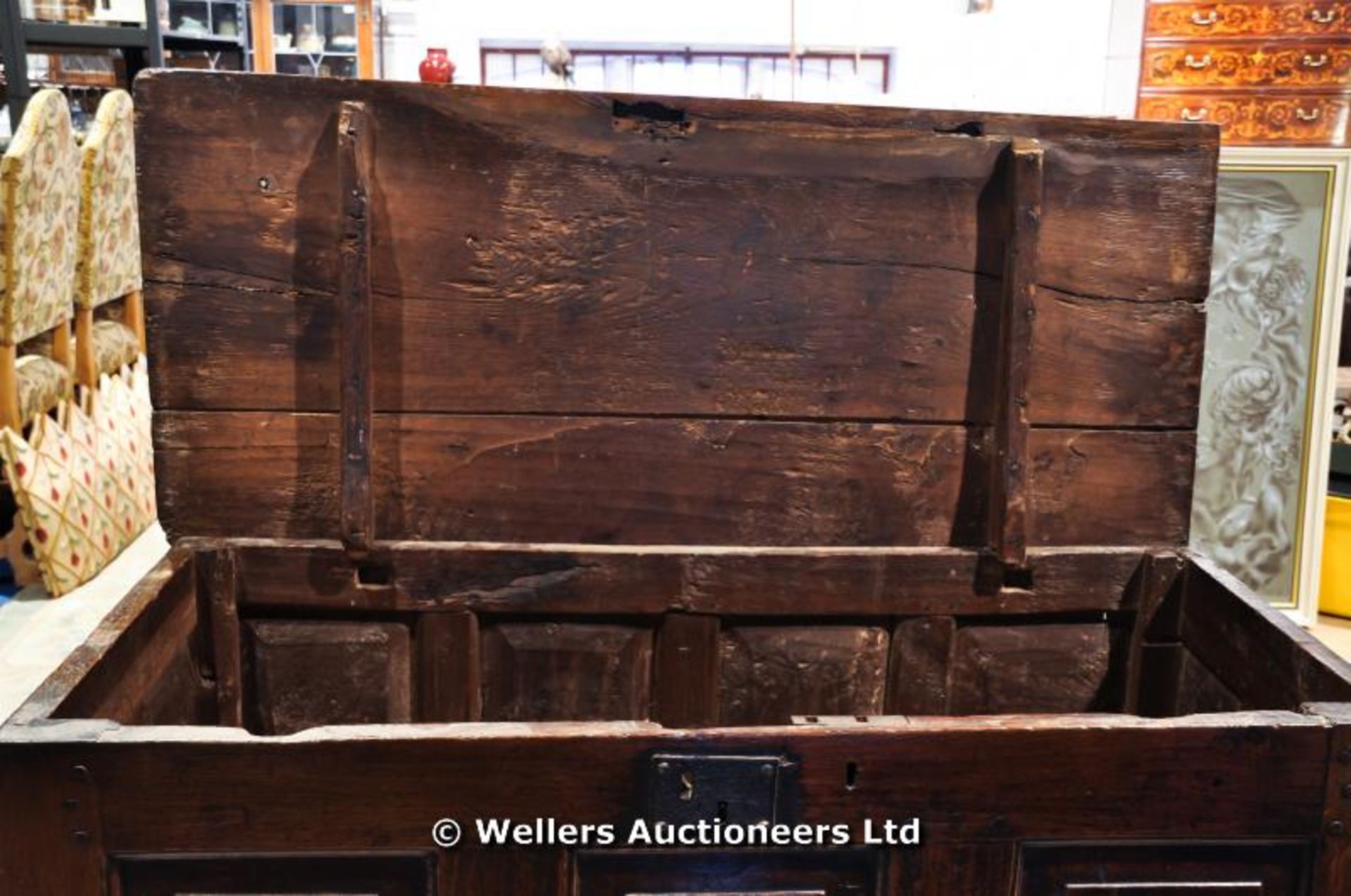 An 18thC oak mule chest, three panelled front with plank construction lid - Image 4 of 5
