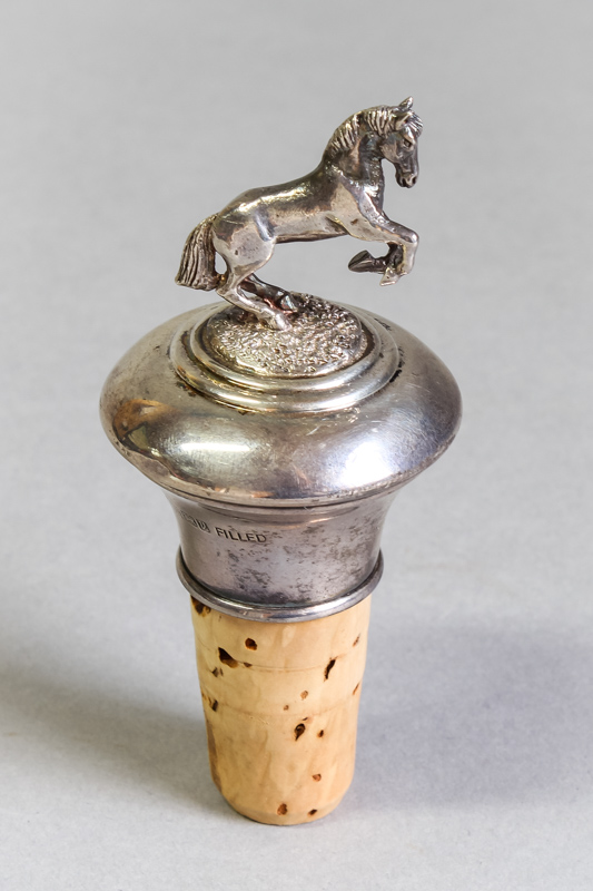 A silver bottle stopper formed as a rearing horse, makers mark AJP, Birmingham, modern