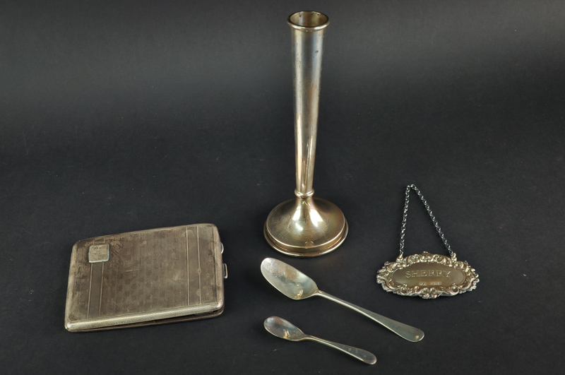 A small quantity of silver items, including a cigarette case, Birmingham 1927; decanter label for