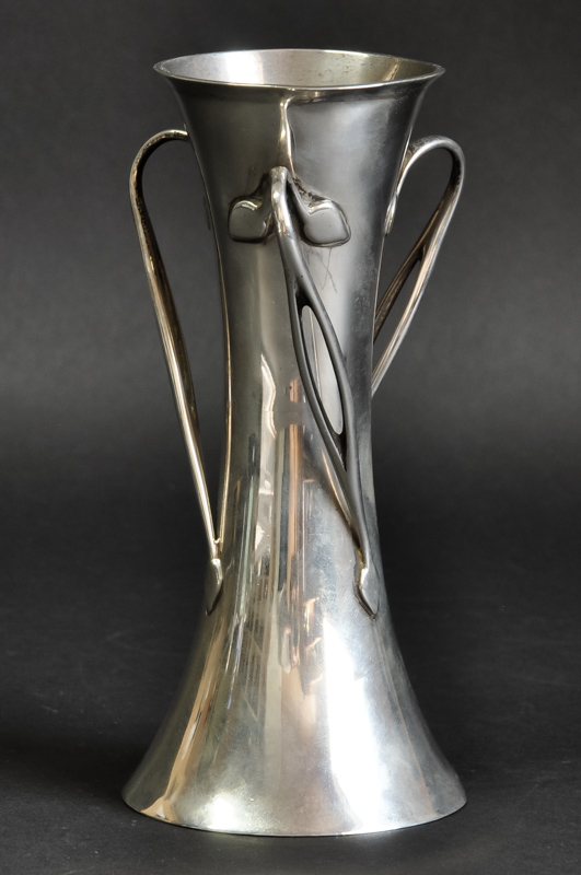 A silver Art Nouveau bud vase, of Cymric style, makers mark HM, Birmingham 1908, 170grs approx.